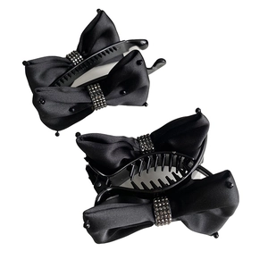 Elegant black satin bow banana hair clips with sparkling silver rhinestones in a set of two