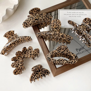 French vintage leopard print hair claw clip set for women showing multiple elegant styles