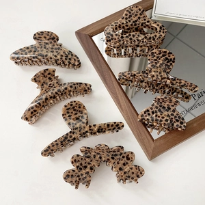French retro leopard print hair claw clips set in tortoise shell finish for women