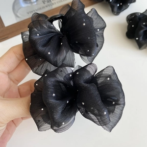 Elegant black tulle bow hair claw clip with rhinestones for winter hair styling