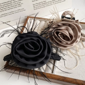 Elegant rose and feather large hair claw clip in black and champagne satin colors
