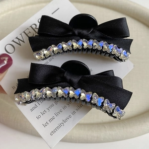 Elegant black ribbon bow hair claws with sparkling rhinestones in a two-piece set