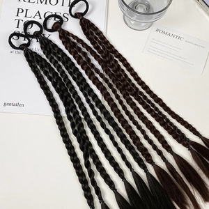 Detail of 45cm braided ponytail hair extensions on high-elastic bands in various colors