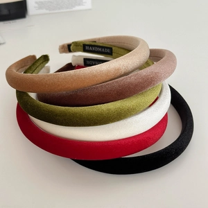 Classic velvet padded headbands in multiple retro colors featuring handmade woven labels