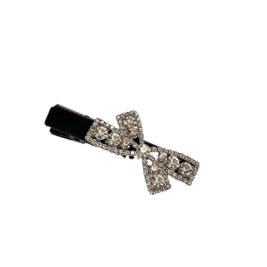 Elegant sparkling rhinestone bow hair clip with high-quality crystals and black alligator base