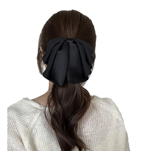 Elegant large black layered bow hair clip for women in minimalist French style