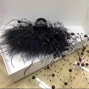 Fashionable black feather hair claw clip with deep red beaded fringe hair accessories