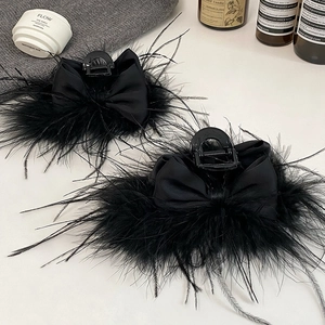 Elegant black ostrich feather hair claw clip with silk bow for princess hairstyle