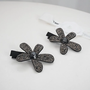 Set of two luxury sparkling rhinestone flower hair clips with grey crystals and black ribbon