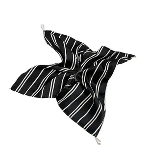 Elegant black and white striped satin hair scrunchie with silver pearl drop charms