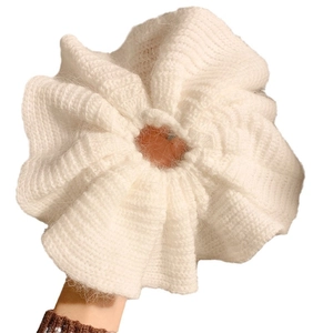 Oversized white knitted scrunchie hair tie with mohair texture and ruffled edge design