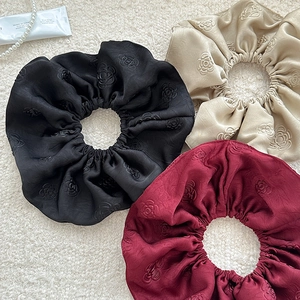 Three-piece jacquard satin scrunchies set with floral texture in black, burgundy, and gold