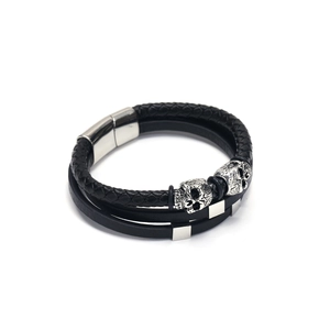 Mens multi-layer punk leather bracelet with silver skull charms and magnetic clasp