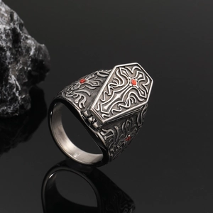 Gothic stainless steel coffin ring with cross relief and red gemstone detail