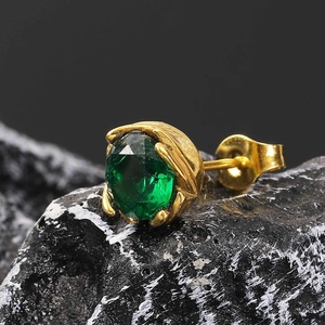 Vintage titanium steel stud earring featuring a green emerald-cut gemstone in gold setting