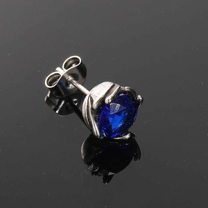 Minimalist vintage titanium steel stud earring featuring a claw-set blue round-cut crystal