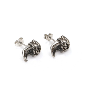 Boucles d'oreilles punk rétro en acier titane avec crâne et finition vieillie