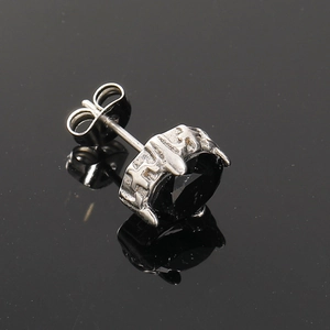 Gothic style titanium steel stud featuring oval black zircon with lava texture finish