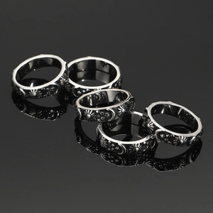 5-piece vintage silver celestial rings set with embossed sun moon and star patterns
