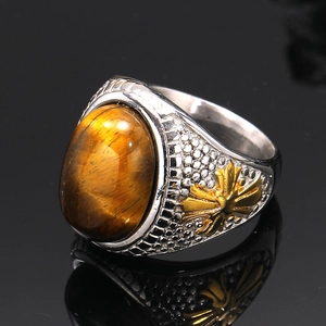 Vintage men's titanium steel ring with tiger eye stone and embossed golden patterns