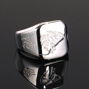 Macro detail of Anubis stainless steel signet ring with eagle patterns and mirror finish