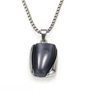 Collana unisex in acciaio titanio con ciondolo occhio di gatto grigio e catena silver
