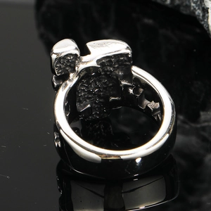 Vintage abstract mask split face ring in titanium steel with rugged grainy texture finish