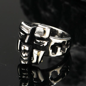 Retro split face mask ring in silver titanium steel with futuristic industrial design