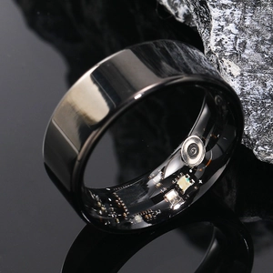 Smart ring with visible internal PCB and sensors for health tracking in black finish