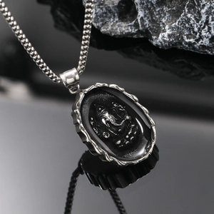 Oval elephant ganesha pendant necklace in stainless steel with black embossed panel