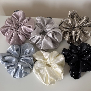 Detailed set of 6 satin polka dot scrunchies in assorted soft colors with fashion labels
