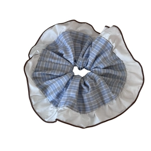 Oversized blue coffee checkered scrunchie with white ruffle trim and brown stitched edge