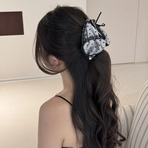 Vintage satin polka dot lace bow hair claw with pearl pendant shown on half-up hair