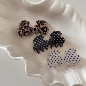 Set of 6 mini polka dot and leopard print hair clips for elegant styling accessories