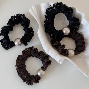 Elegant silk hair scrunchies with lace trim and large pearl beads in black and brown