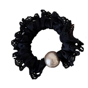 Elegant black satin and lace scrunchie with a large champagne pearl bead for ponytails