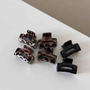 Detailed set of 6 mini leopard and black square resin hair claw clips for styling