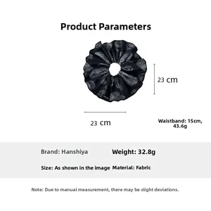 Detailed specs of the large black scrunchie with silver feather pattern and 23cm diameter