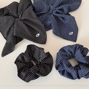 Set of four polka dot scrunchies with long ribbon ties and oval bow charms