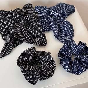 Polka dot hair scrunchies set including large bow hair ties in black and navy blue colors