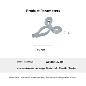 Technical drawing showing 13cm length and 7cm height of the white resin bow hair claw clip