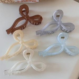 Elegant jelly-colored bow hair claws in five translucent shades for women's hairstyling