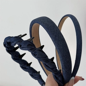 Three vintage deep blue denim headbands in braided and smooth styles for women