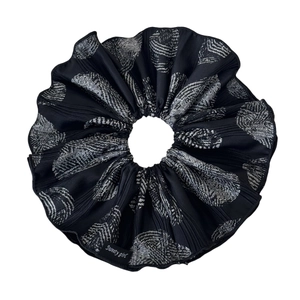 Pleated black scrunchie with white abstract pattern and Sweety Girl woven label