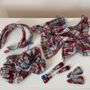 Detailed set of red and blue checkered fabric hair accessories with cute heart buttons