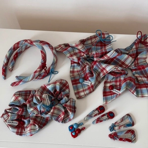Red and blue plaid fabric hair accessory set with headbands, scrunchies and bow clips