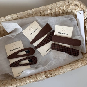 Vintage brown plaid fabric hair clip set on display card for stylish hair styling