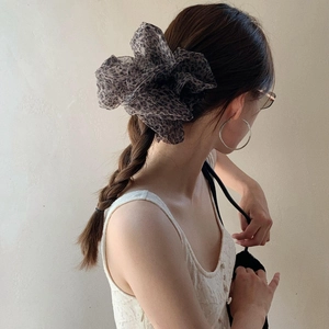 Brown leopard print oversized mesh scrunchie accessory for a stylish ponytail look