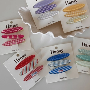 Lot de 3 barrettes à cheveux colorées au fini gelée avec motifs à carreaux sur carte
