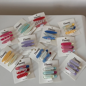 Lot de 3 barrettes à cheveux gelée colorées avec motifs à carreaux et étoiles sur carte
